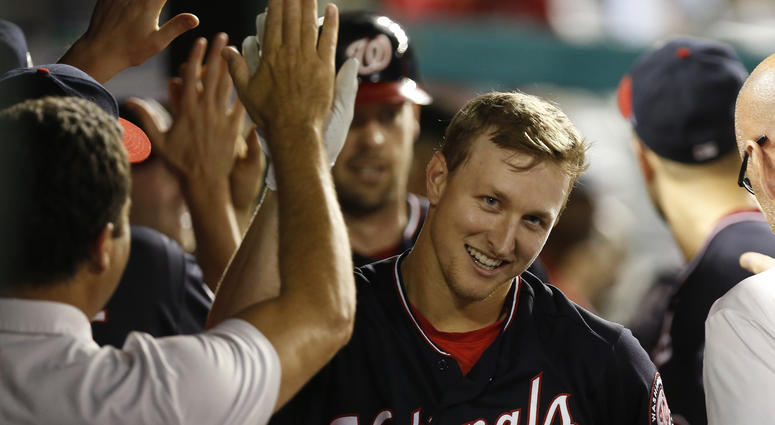 Andrew Stevenson celebrates in the dugout after hitting a home run for the Nationals. Andrew_Stevenson