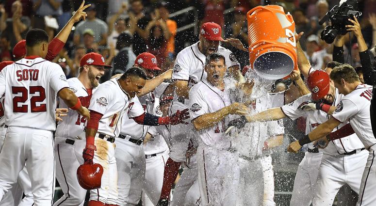 The Nationals celebrate Ryan Zimmerman's walk-off home run against the Phillies. Ryan_Zimmerman_Walk_Off