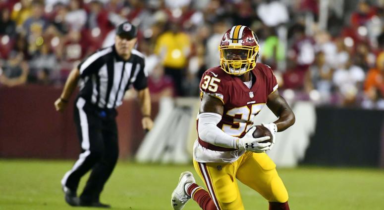 Kapri Bibbs carries the ball for the Redskins. Kapri_Bibbs