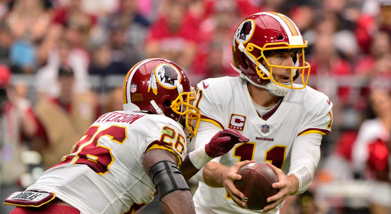 Adrian Peterson and Alex Smith of the Washington Redskins. alex_smith_adrian_peterson_redskins