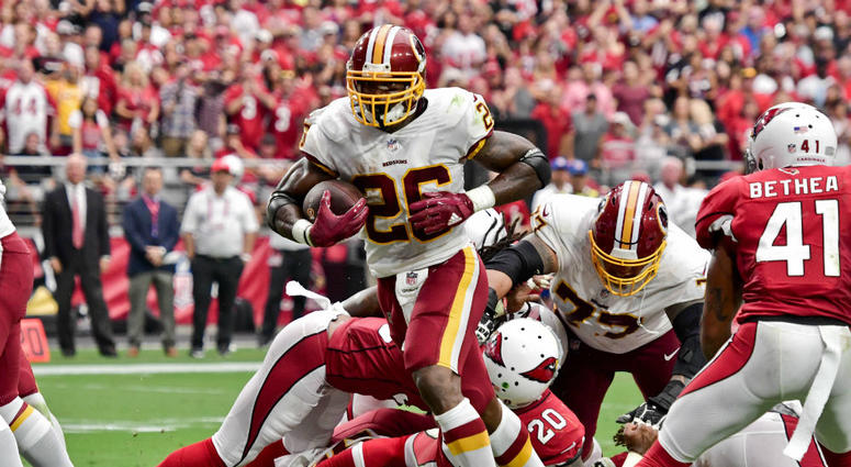 Adrian Peterson scores a touchdown in Arizona. Adrian_Peterson_Redskins