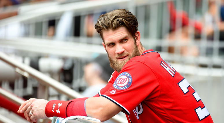 Bryce Harper sits in Nats' dugout. Bryce_Harper_Nats