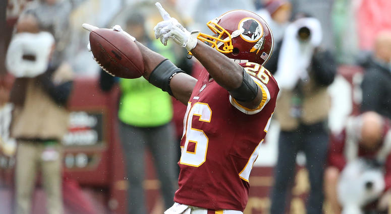Adrian Peterson celebrates a touchdown. Adrian_Peterson_Redskins