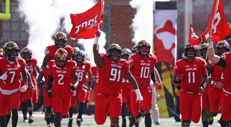 Maryland Terrapins players enter the field. Maryland_Terps_Football