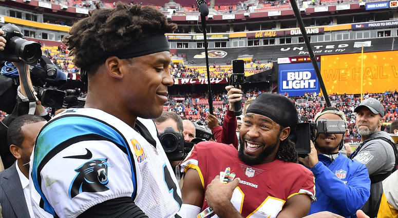 Josh Norman chats with Cam Newton postgame. Josh_Norman_Cam_Newton