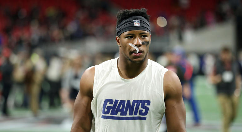 Saquon Barkley walks off the field after the Giants' sixth loss of the season Saquon_Barkley
