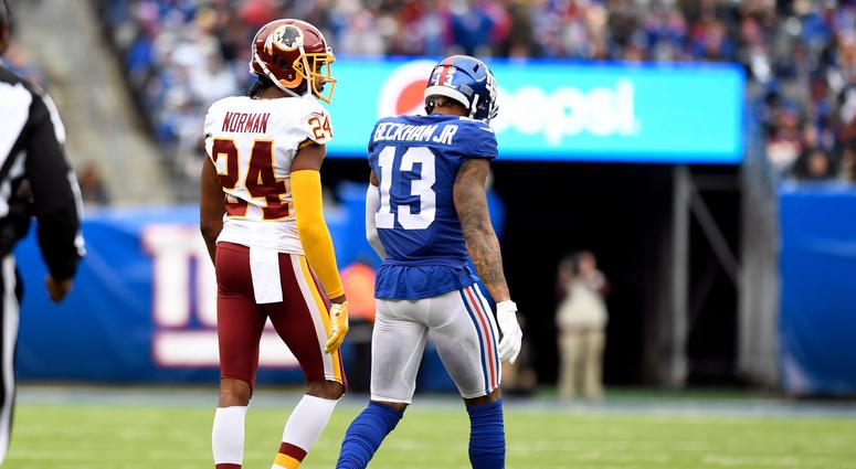 Josh Norman and Odell Beckham talking on the field during Redskins-Giants Josh_Norman_Odell_Beckham