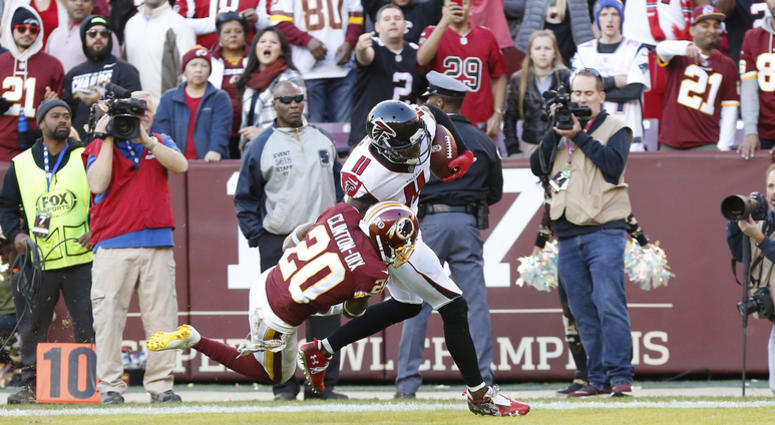 Ha Ha Clinton-Dix tries to tackle Julio Jones. Ha_Ha_Clinton_Dix_Julio_Jones