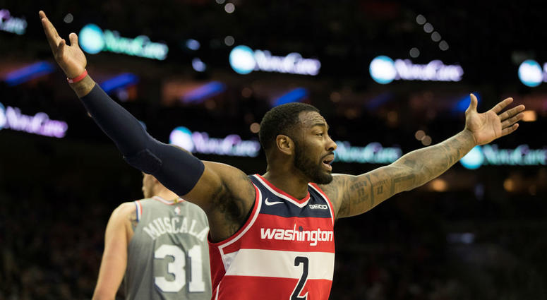 Wizards guard John Wall wants a foul call. Wizards_John_Wall