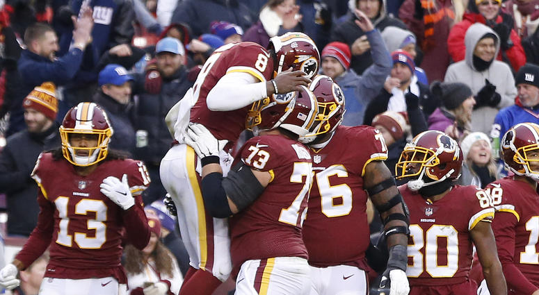 Josh Johnson celebrates with Chase Roullier after scoring a touchdown against the Giants Josh Johnson gets his first start since 2011