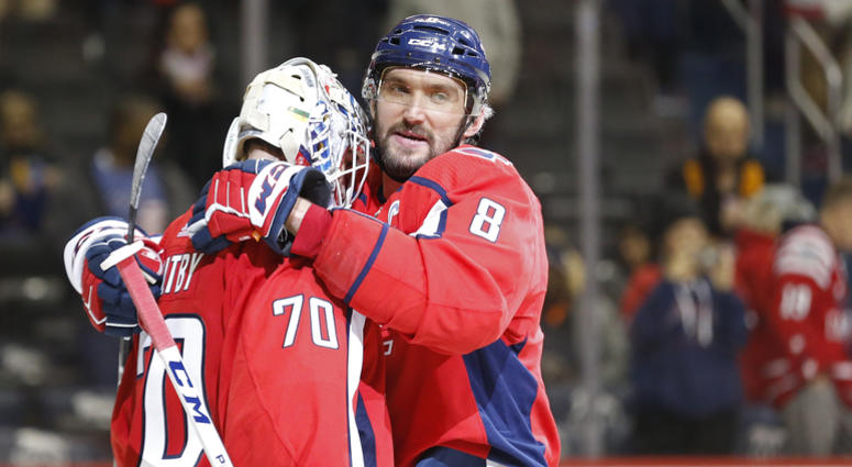 Alex Ovechkin embraces Braden Holtby. alex_ovechkin_braden_holtby