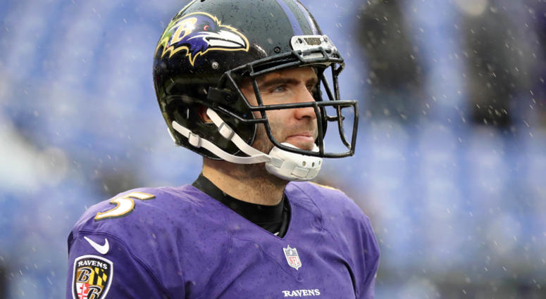 Flacco warms up in the rain prior to his first career game as a backup Craig Hoffman: Redskins' interest in Joe Flacco was overblown