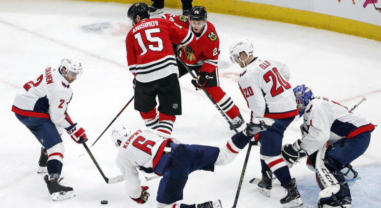 The Washington Capitals defend against the Chicago Blackhawks. Capitals_Blackhawks