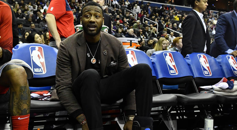 John Wall watches from the Wizards bench while recovering from heel surgery John Wall ruptures Achilles recovering from season-ending heel surgery