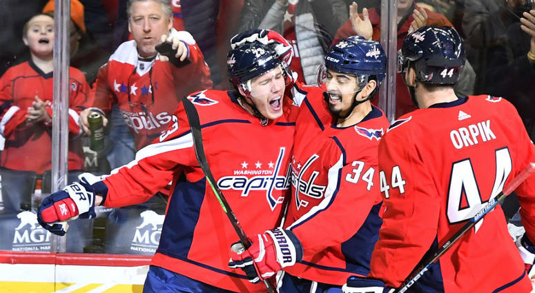 Dmitrij Jaskin celebrates with Jonas Siegenthaler after scoring. Dmitrij_Jaskin_Capitals