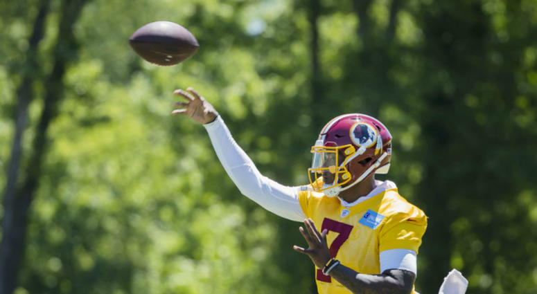 Washington Redskins Dwayne Haskins throws a pass at minicamp. Redskins rookie QB Dwayne Haskins isn't worried about starting Week 1.