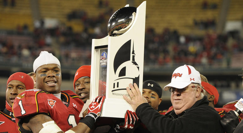Ralph Friedgen poses with the trophy following the 2010 Military Bowl ralph_friedgen_terps