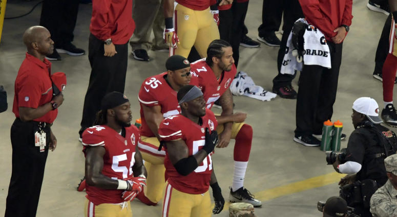 Colin Kaepernick and Eric Reid, the first 49ers teammate to join Kaepernick in his protest, kneeling during the National Anthem ahead of a Sept. 2016 game Kaepernick earns 'moral' victory in reaching settlement with NFL