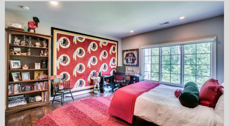 A Redskins-themed bedroom inside Bruce Allen's home. Bruce Allen's McLean, Virginia mansion is up for sale again.