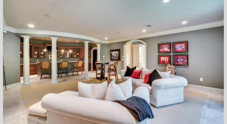 A fully furnished lower-level inside Bruce Allen's home. Bruce Allen's McLean, Virginia mansion is up for sale again.