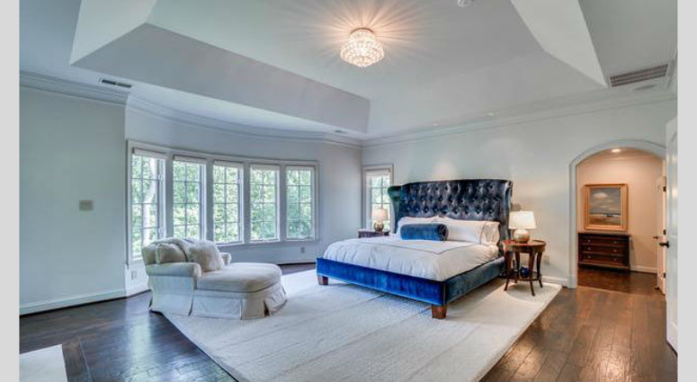 The master suite inside Bruce Allen's home. Bruce Allen's McLean, Virginia mansion is up for sale again.