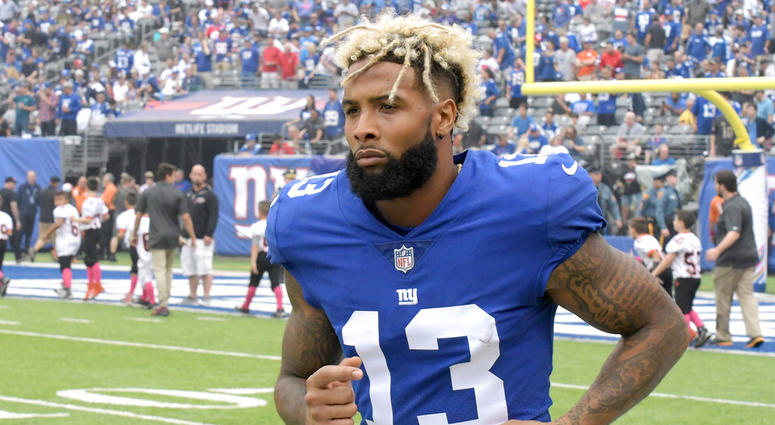 FILE - In this Oct. 8, 2017, file photo, New York Giants wide receiver Odell Beckham warms up prior to an NFL football game against the Los Angeles Chargers, in East Rutherford, N.J. The Giants have opened their first organized team activities under new c FILE - In this Oct. 8, 2017, file photo, New York Giants wide receiver Odell Beckham warms up prior to an NFL football game against the Los Angeles Chargers, in East Rutherford, N.J. The Giants have opened their first organized team activities under new c