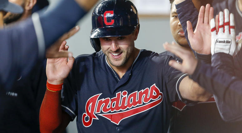 Apr 1, 2018; Seattle, WA, USA; Cleveland Indians right fielder Lonnie Chisenhall (8) is greeted in the dugout after scoring a run against the Seattle Mariners during the second inning at Safeco Field. Apr 1, 2018; Seattle, WA, USA; Cleveland Indians right fielder Lonnie Chisenhall (8) is greeted in the dugout after scoring a run against the Seattle Mariners during the second inning at Safeco Field.