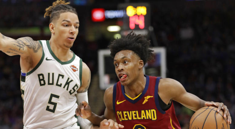 Cleveland Cavaliers' Collin Sexton (2) drives past Milwaukee Bucks' D.J. Wilson (5) during the second half of an NBA basketball game Wednesday, March 20, 2019, in Cleveland. The Cavaliers won 107-102. (AP Photo/Tony Dejak) Cleveland Cavaliers' Collin Sexton (2) drives past Milwaukee Bucks' D.J. Wilson (5) during the second half of an NBA basketball game Wednesday, March 20, 2019, in Cleveland. The Cavaliers won 107-102. (AP Photo/Tony Dejak)