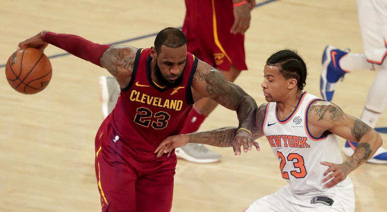 Cleveland Cavaliers forward LeBron James, left, drives against New York Knicks guard Trey Burke, right, during the third quarter of an NBA basketball game, Monday, April 9, 2018, in New York. (AP Photo/Julie Jacobson) Cleveland Cavaliers forward LeBron James, left, drives against New York Knicks guard Trey Burke, right, during the third quarter of an NBA basketball game, Monday, April 9, 2018, in New York. (AP Photo/Julie Jacobson)