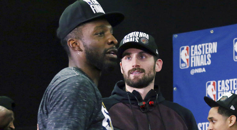 Cleveland Cavaliers forward Jeff Green, left, and center Kevin Love celebrate after beating the Boston Celtics 87-79 in Game 7 of the NBA basketball Eastern Conference Finals, Sunday, May 27, 2018, in Boston. Cleveland Cavaliers forward Jeff Green, left, and center Kevin Love celebrate after beating the Boston Celtics 87-79 in Game 7 of the NBA basketball Eastern Conference Finals, Sunday, May 27, 2018, in Boston.