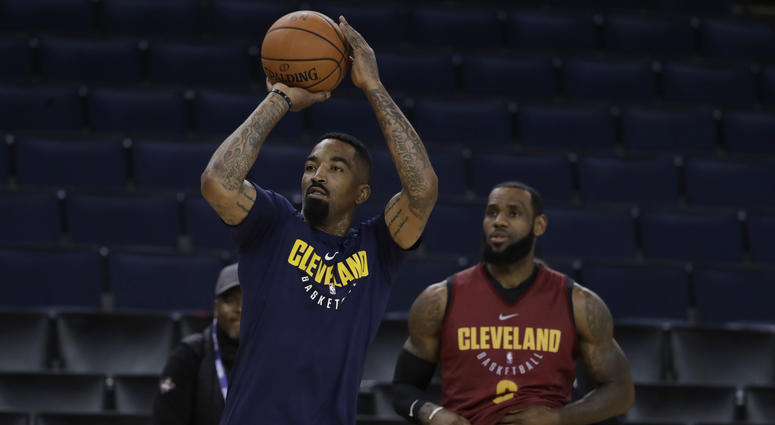 Cleveland Cavaliers' J.R. Smith, left, shoots as his teammate LeBron James watches during an NBA basketball practice, Wednesday, May 30, 2018, in Oakland, Calif. The Cavaliers face the Golden State Warriors in Game 1 of the NBA Finals on Thursday in Oakla Cleveland Cavaliers' J.R. Smith, left, shoots as his teammate LeBron James watches during an NBA basketball practice, Wednesday, May 30, 2018, in Oakland, Calif. The Cavaliers face the Golden State Warriors in Game 1 of the NBA Finals on Thursday in Oakla