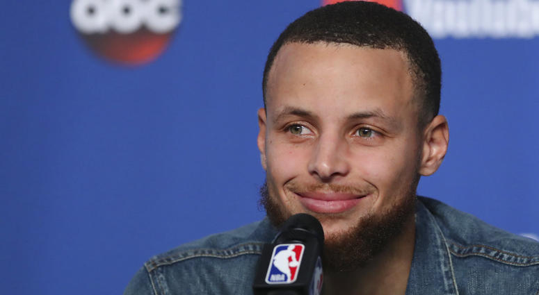 Golden State Warriors guard Stephen Curry (30) speaks during a press conference following Game 3 of basketball's NBA Finals, early Wednesday June 7, 2018, in Cleveland. The Warriors defeated the Cleveland Cavaliers 110-102 to take a 3-0 lead in the series Golden State Warriors guard Stephen Curry (30) speaks during a press conference following Game 3 of basketball's NBA Finals, early Wednesday June 7, 2018, in Cleveland. The Warriors defeated the Cleveland Cavaliers 110-102 to take a 3-0 lead in the series