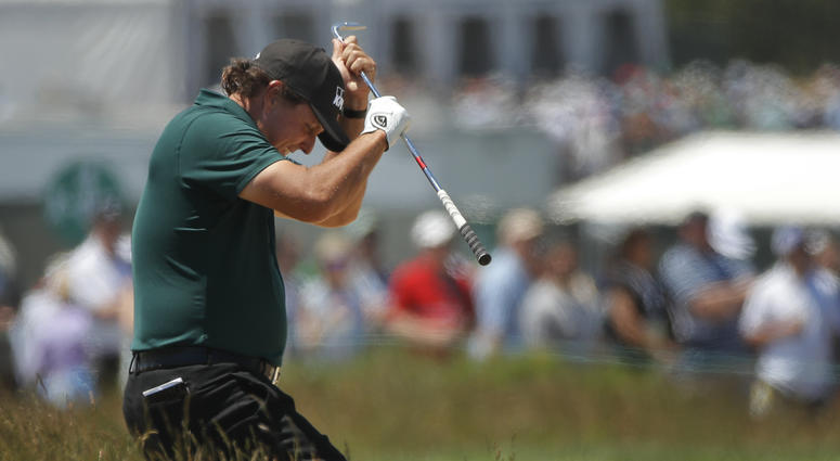 Phil Mickelson reacts to a shot from the fescue on the fifth hole during the third round of the U.S. Open Golf Championship, Saturday, June 16, 2018, in Southampton, N.Y. Phil Mickelson reacts to a shot from the fescue on the fifth hole during the third round of the U.S. Open Golf Championship, Saturday, June 16, 2018, in Southampton, N.Y.