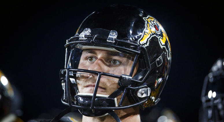 Hamilton Tiger-Cats quarterback Johnny Manziel looks on from the sideline during second-half CFL football game action against the Saskatchewan Roughriders in Hamilton, Ontario. Manziel is headed to the Montreal Alouettes. Montreal acquired the former Heisman Trophy winner and offensive linemen Tony Washington and Landon Rice from the Hamilton Tiger-Cats