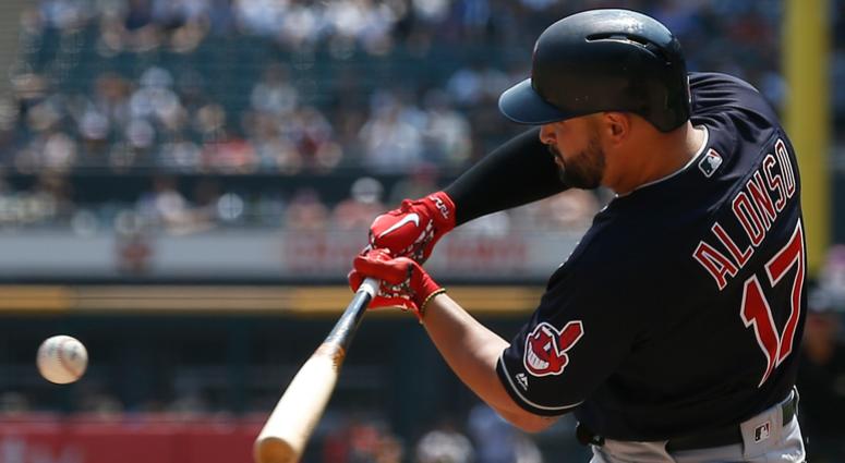 Cleveland Indians' Yonder Alonso hits an RBI single against the Chicago White Sox during the first inning of a baseball game Sunday, Aug. 12, 2018, in Chicago. Cleveland Indians' Yonder Alonso hits an RBI single against the Chicago White Sox during the first inning of a baseball game Sunday, Aug. 12, 2018, in Chicago.