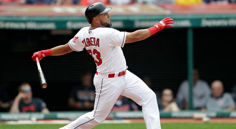 Cleveland Indians' Melky Cabrera watches his grand slam off Baltimore Orioles relief pitcher Sean Gilmartin in the fourth inning of a baseball game, Sunday, Aug. 19, 2018, in Cleveland. Michael Brantley, Jose Ramirez and Yandy Diaz also scored on the play Cleveland Indians' Melky Cabrera watches his grand slam off Baltimore Orioles relief pitcher Sean Gilmartin in the fourth inning of a baseball game, Sunday, Aug. 19, 2018, in Cleveland. Michael Brantley, Jose Ramirez and Yandy Diaz also scored on the play