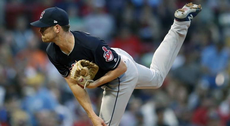 Cleveland Indians' Shane Bieber pitches during the first inning of a baseball game against the Boston Red Sox in Boston, Tuesday, Aug. 21, 2018. Cleveland Indians' Shane Bieber pitches during the first inning of a baseball game against the Boston Red Sox in Boston, Tuesday, Aug. 21, 2018.