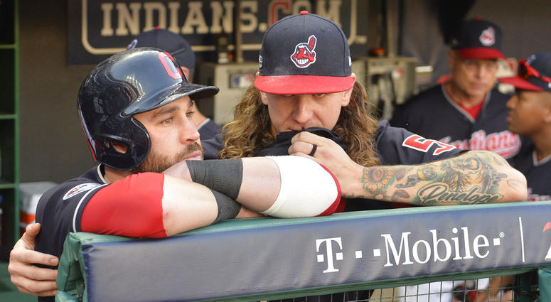 Cleveland Indians' Jason Kipnis, left, is hugged by starting pitcher Mike Clevinger after the Houston Astros defeated the Indians 11-3 in Game 3 of a baseball American League Division Series, Monday, Oct. 8, 2018, in Cleveland. (AP Photo/Phil Long) Cleveland Indians' Jason Kipnis, left, is hugged by starting pitcher Mike Clevinger after the Houston Astros defeated the Indians 11-3 in Game 3 of a baseball American League Division Series, Monday, Oct. 8, 2018, in Cleveland. (AP Photo/Phil Long)