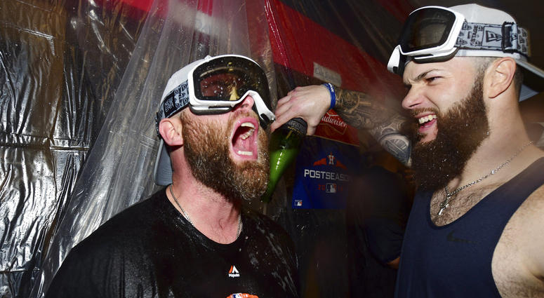 Houston Astros starting pitcher Dallas Keuchel, right, celebrates with Brian McCann after the Astros defeated the Cleveland Indians 11-3 in Game 3 of a baseball American League Division Series, Monday, Oct. 8, 2018, in Cleveland. (AP Photo/David Dermer) Houston Astros starting pitcher Dallas Keuchel, right, celebrates with Brian McCann after the Astros defeated the Cleveland Indians 11-3 in Game 3 of a baseball American League Division Series, Monday, Oct. 8, 2018, in Cleveland.