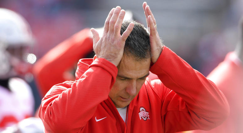 In this Saturday, Nov. 17, 2018 photo, Ohio State head coach Urban Meyer holds his hands to his head before an NCAA football game against Maryland in College Park, Md. Urban Meyer doesn’t seem to be having much fun these days. The Ohio State coach is not In this Saturday, Nov. 17, 2018 photo, Ohio State head coach Urban Meyer holds his hands to his head before an NCAA football game against Maryland in College Park, Md. Urban Meyer doesn’t seem to be having much fun these days. The Ohio State coach is not