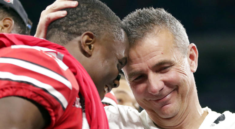 Ohio State head coach Urban Meyer and wide receiver Terry McLaurin, left, celebrate early Sunday, Dec. 2, 2018, after defeating Northwestern 45-24 in the Big Ten championship NCAA college football game in Indianapolis. Ohio State head coach Urban Meyer and wide receiver Terry McLaurin, left, celebrate early Sunday, Dec. 2, 2018, after defeating Northwestern 45-24 in the Big Ten championship NCAA college football game in Indianapolis. (AP Photo/Michael Conroy)