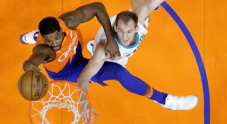 Cleveland Cavaliers' Tristan Thompson, left, drives to the basket against Charlotte Hornets' Cody Zeller in the first half of an NBA basketball game, Tuesday, Nov. 13, 2018, in Cleveland. Tristan Thompson Cleveland Cavaliers rebound against Charlotte Hornets