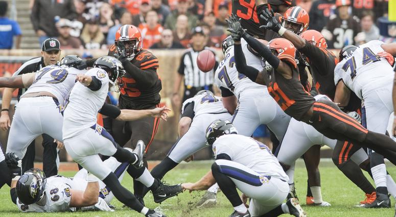 Oct 7, 2018; Cleveland, OH, USA; Cleveland Browns cornerback Denzel Ward (21) blocks the field goal attempt of Baltimore Ravens kicker Justin Tucker (9) during the second quarter at FirstEnergy Stadium.