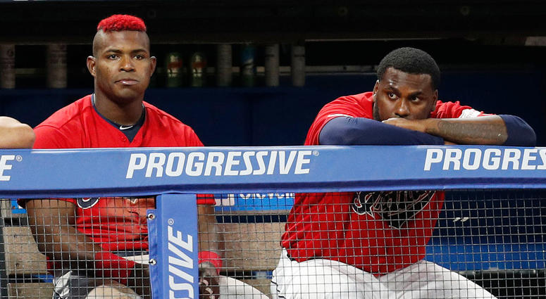 CLEVELAND, OH - AUGUST 01: Yasiel Puig #66 and Franmil Reyes #32 of the Cleveland Indians watch from the dugout in the eighth inning against the Houston Astros at Progressive Field on August 1, 2019 in Cleveland, Ohio. The Astros defeated the Indians 7-1. CLEVELAND, OH - AUGUST 01: Yasiel Puig #66 and Franmil Reyes #32 of the Cleveland Indians watch from the dugout in the eighth inning against the Houston Astros at Progressive Field on August 1, 2019 in Cleveland, Ohio. The Astros defeated the Indians 7-1.