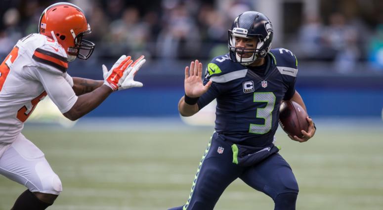 SEATTLE, WA - DECEMBER 20: Quarterback Russell Wilson #3 of the Seattle Seahawks runs with the ball during the first half of a football game against the Cleveland Browns at CenturyLink Field on December 20, 2015 in Seattle, Washington. The Seahawks won th SEATTLE, WA - DECEMBER 20: Quarterback Russell Wilson #3 of the Seattle Seahawks runs with the ball during the first half of a football game against the Cleveland Browns at CenturyLink Field on December 20, 2015 in Seattle, Washington. The Seahawks won th