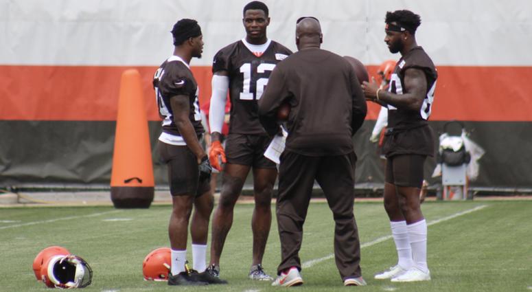 Corey Coleman, Josh, Gordon and Jarvis Landry chat with receivers coach Adam Henry during practice. Corey Coleman, Josh, Gordon and Jarvis Landry chat with receivers coach Adam Henry during practice.