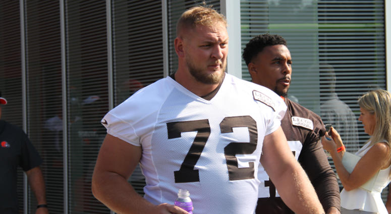 Cleveland Browns starting RG Eric Kush enters the practice field on the first day of training camp in July Cleveland Browns starting right guard Eric Kush enters the practice field on the first day of training camp in July