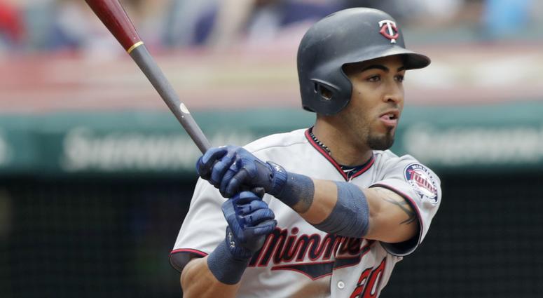 Minnesota Twins' Eddie Rosario hits an RBI-single off Cleveland Indians relief pitcher Tyler Olson in the sixth inning of a baseball game, Saturday, June 16, 2018, in Cleveland. Ehire Adrianza scored on the play. Minnesota Twins' Eddie Rosario hits an RBI-single off Cleveland Indians relief pitcher Tyler Olson in the sixth inning of a baseball game, Saturday, June 16, 2018, in Cleveland. Ehire Adrianza scored on the play.