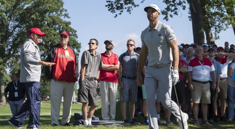 August 5, 2017; Akron, OH, USA; Dustin Johnson walks after his shot from the rough on the second hole during the third round of the WGC - Bridgestone Invitational golf tournament at Firestone Country Club - South Course. August 5, 2017; Akron, OH, USA; Dustin Johnson walks after his shot from the rough on the second hole during the third round of the WGC - Bridgestone Invitational golf tournament at Firestone Country Club - South Course.