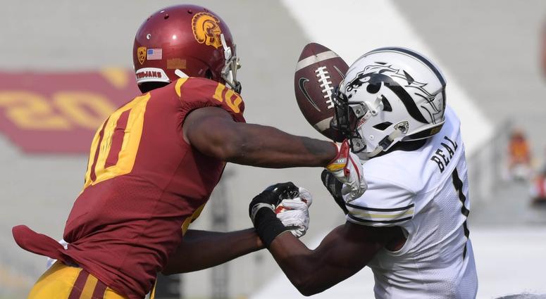 Western Michigan Broncos defensive back Sam Beal (1) intercepts a pass intended for Southern California Trojans wide receiver Jalen Greene (10) during a NCAA football game at Los Angeles Memorial Coliseum. Western Michigan Broncos defensive back Sam Beal (1) intercepts a pass intended for Southern California Trojans wide receiver Jalen Greene (10) during a NCAA football game at Los Angeles Memorial Coliseum.